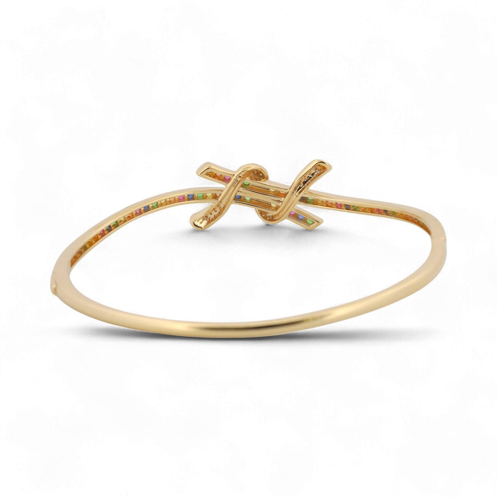 31 Jewels Inc. Effy 14K yellow gold ribbon twist bangle featuring pavé-set multi-color sapphires and diamonds.