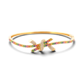31 Jewels Inc. Effy 14K yellow gold ribbon twist bangle featuring multi-color sapphires and pavé-set diamonds.