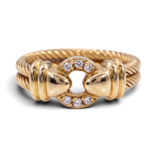 31 Jewels Inc. Philippe Charriol 18k yellow gold cable ring featuring a diamond-accented centerpiece, size 6.