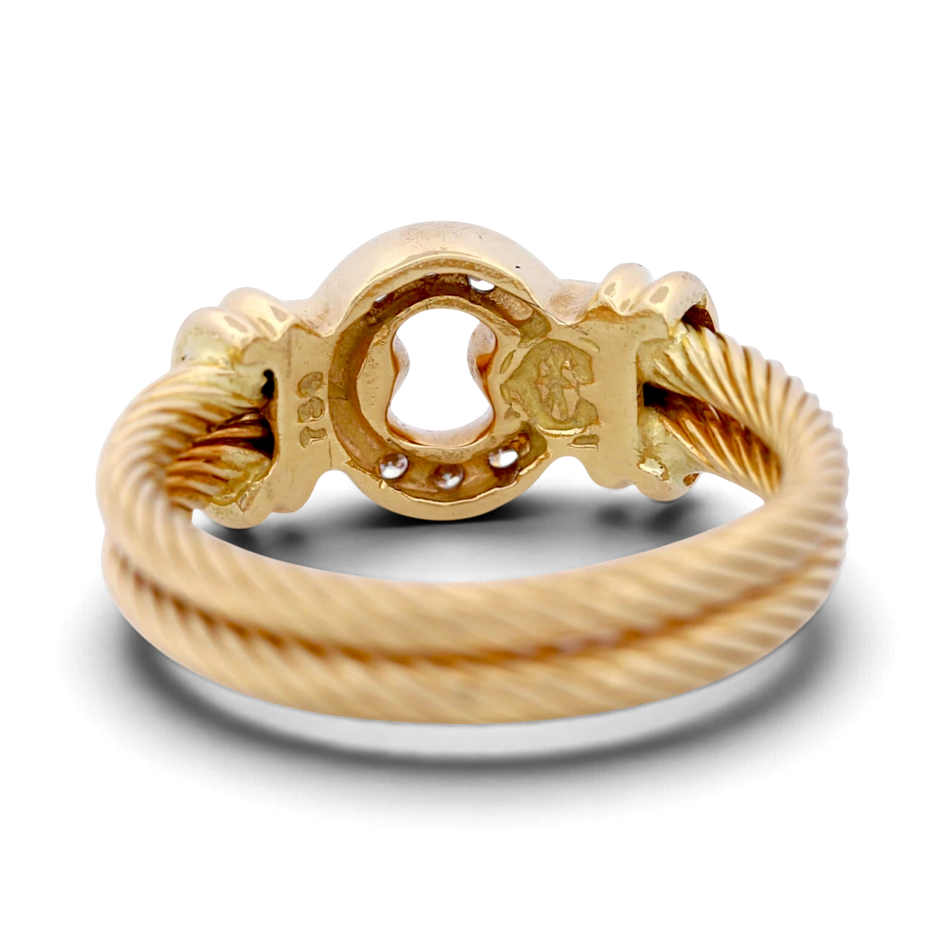 31 Jewels Inc. Philippe Charriol 18k yellow gold cable ring featuring a diamond-accented centerpiece and twisted band.